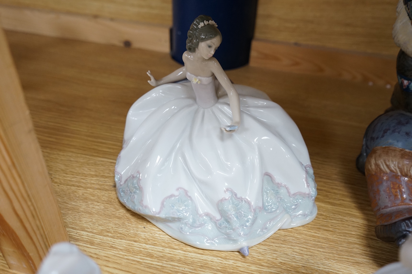 A collection of Lladro to including an eskimo and polar bear group, 23cm high (9)